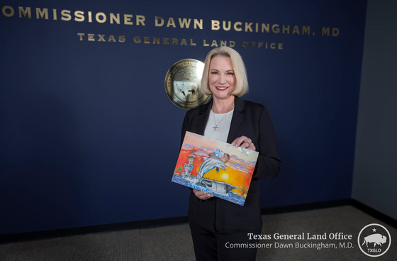 Commissioner Buckingham with the 2025 AAB Art Contest Winning Artwork